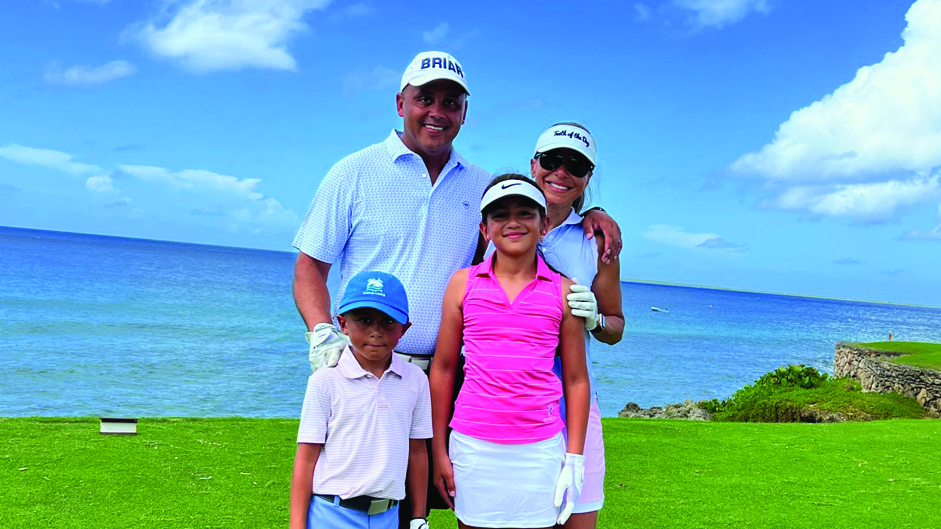 Dr. Merary Simeon and her family standing on a golf course at the beach self-awareness emotional intelligence